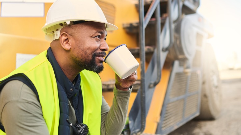 Man drinking from mug