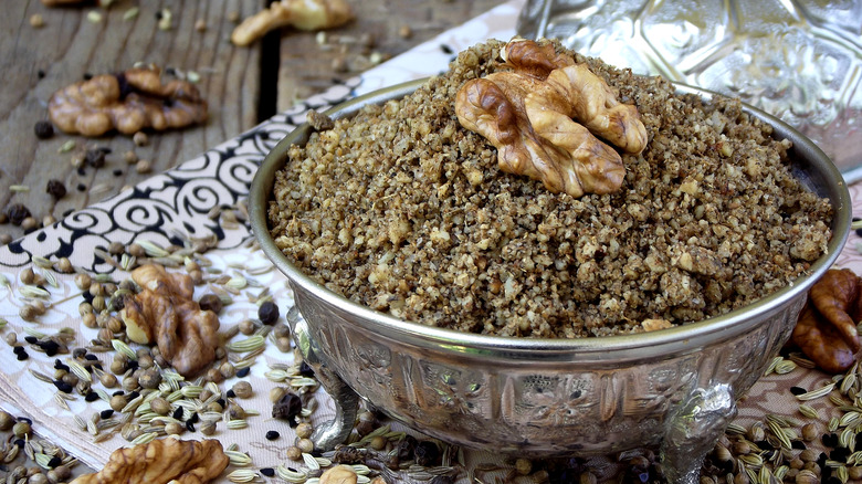 silver bowl heaped with dukkah