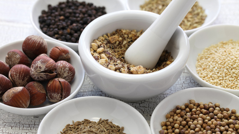 bowls full of dukkah ingredients