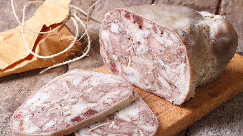 Head cheese sliced on a cutting board