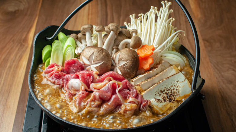 https://www.tastingtable.com/img/gallery/what-exactly-is-japanese-hot-pot/intro-1658510238.jpg