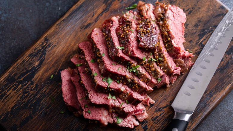 sliced beef on a cutting board