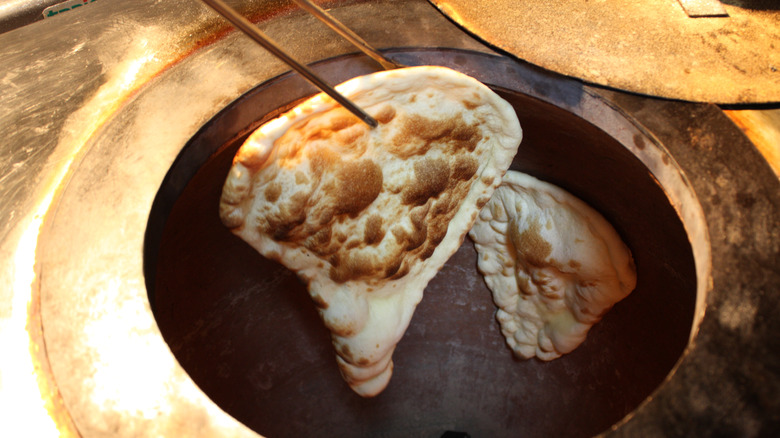 naan baked in tandoor