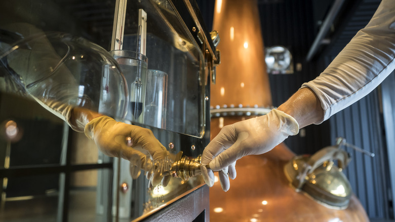 whisky maker working at Japanese distillery