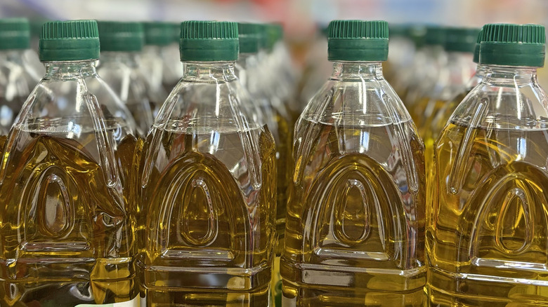 Rows of cooking oil in plastic bottles