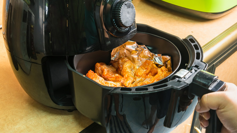 frying chicken in an air fryer