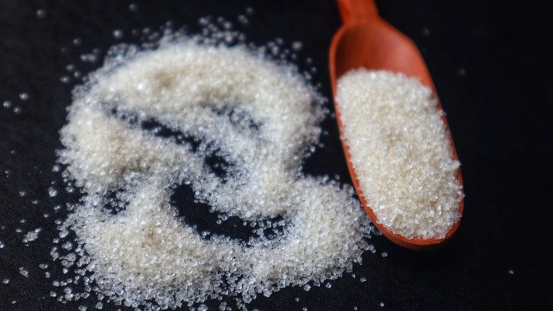 granulated sugar on a spoon