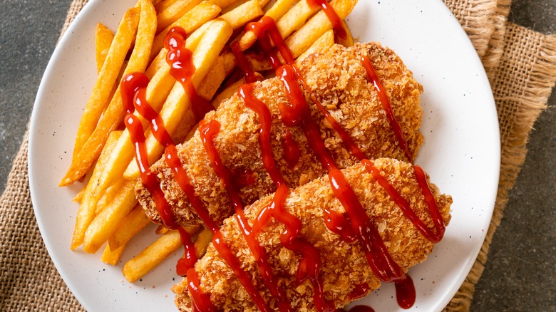 Ketchup on fries and chicken