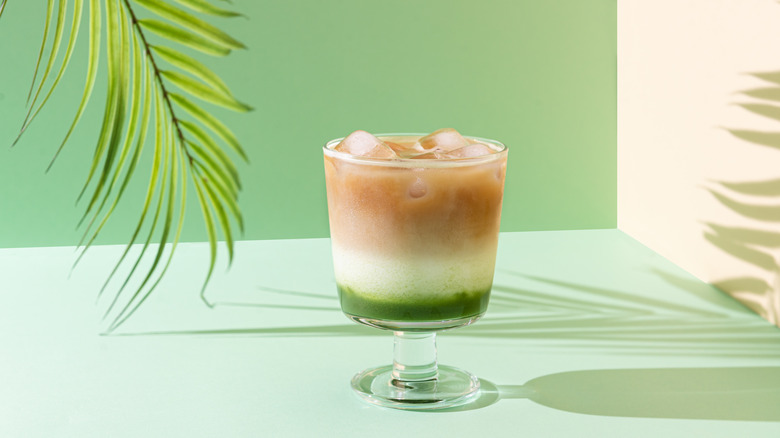 layered matcha, cream and coffee beverage