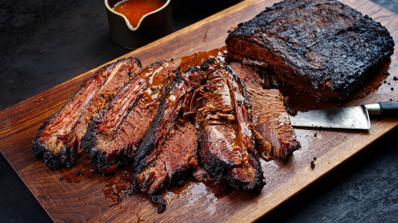 Beef brisket slices wooden surface