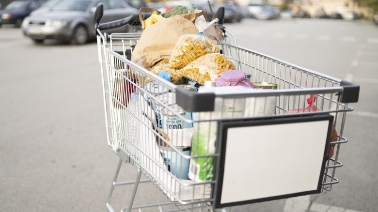 A shopping cart full of groceries