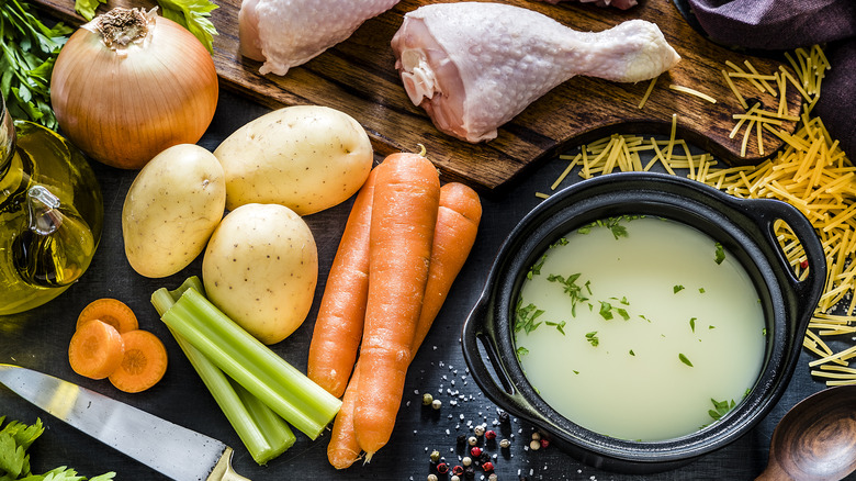 Soup and soup ingredients on a table