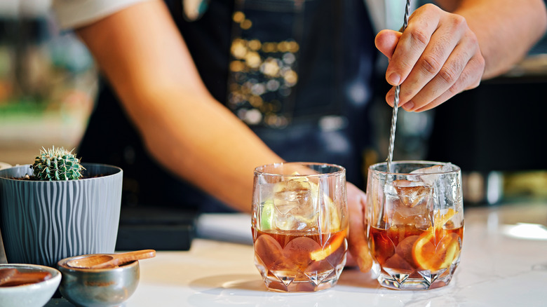 Bartender stirring a drink