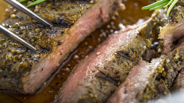 close up of a sliced strip steak