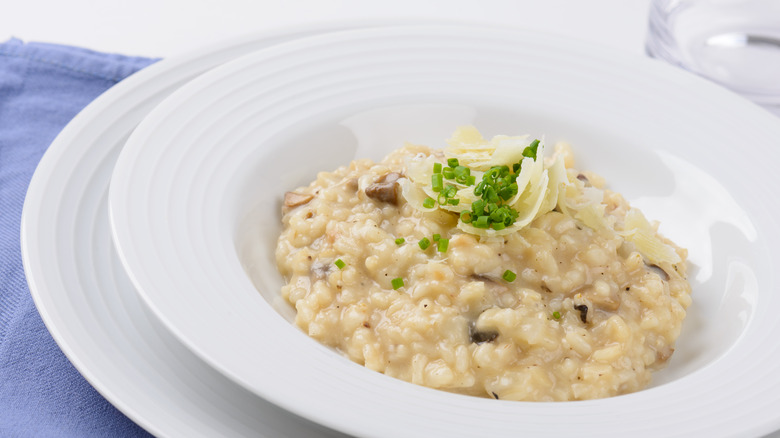 Risotto white plate chive garnish