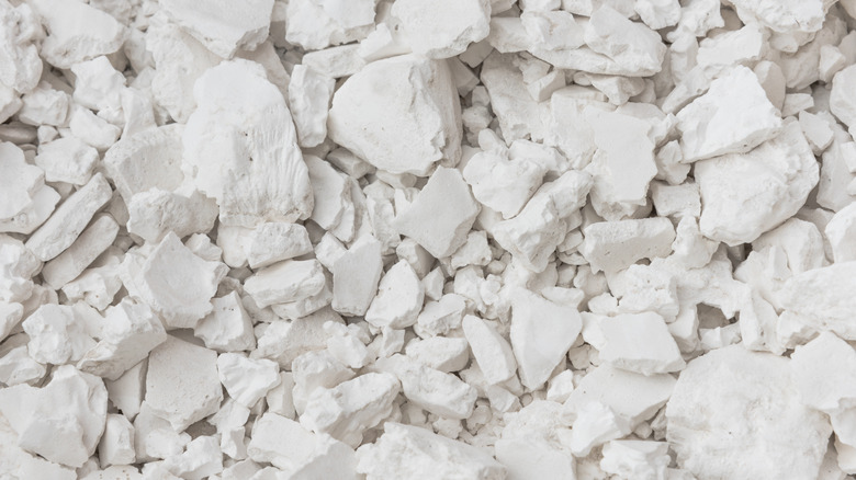 Close-up of clumped white arrowroot powder drying