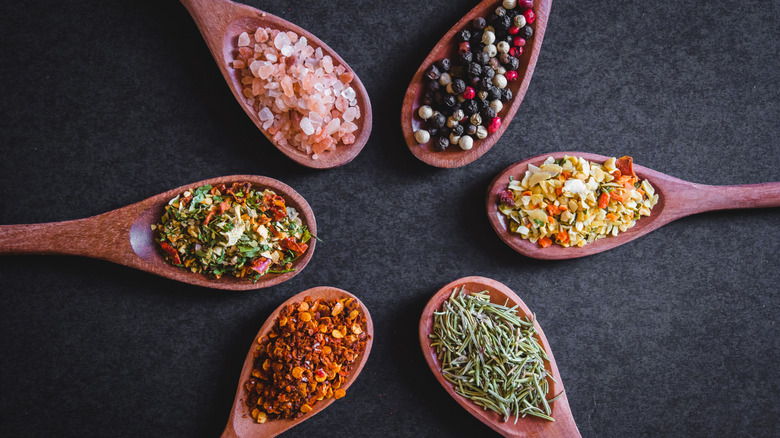 spoons holding different seasonings