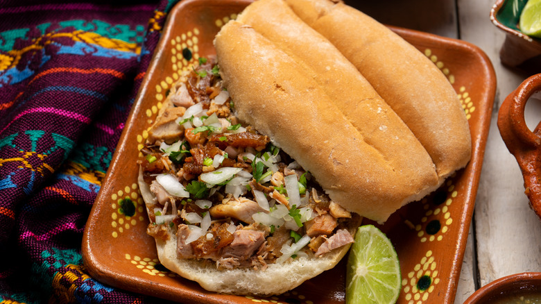 carnitas prepared into a torta