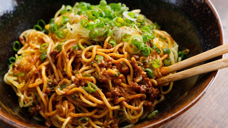 Dan dan noodles with scallions