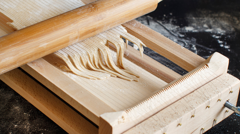 Chitarra pasta being made