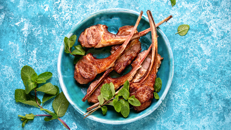 lamb chops with mint sprigs
