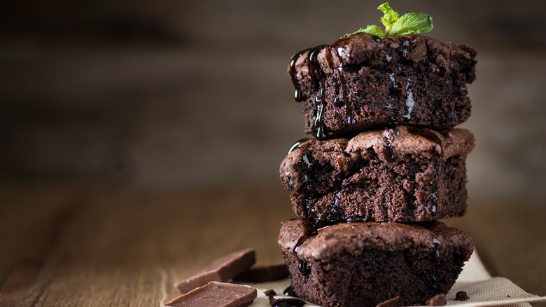 Chocolate brownies with mint garnish