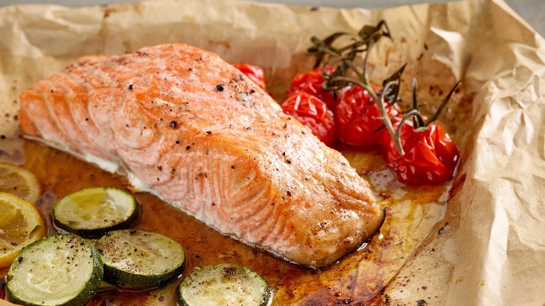 salmon, tomatoes, and zucchini en papillote