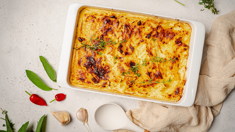 Top-view of homemade Cumberland pie in a casserole dish