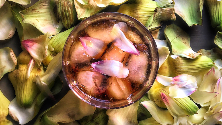 Cynar glass on artichoke leaves