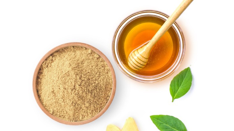 honey in bowl with powder in bowl