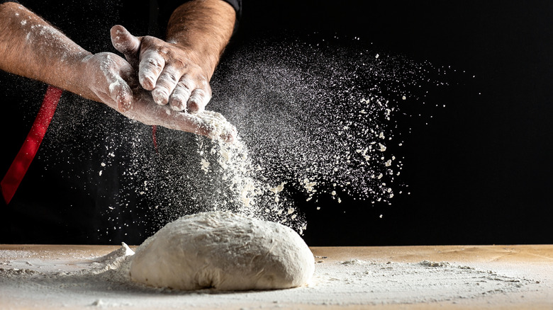 Baker with flour on hands