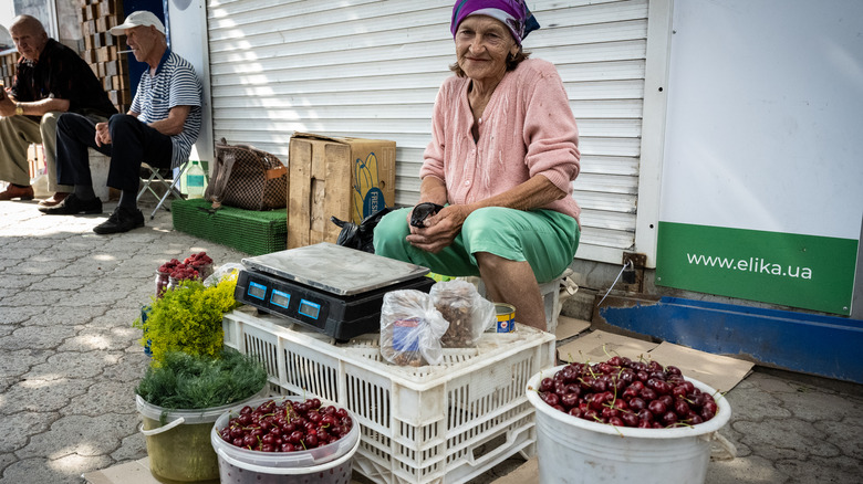 women selling cherries