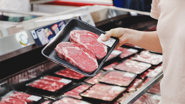 Holding package of steaks