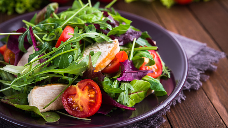 a salad with mesclun