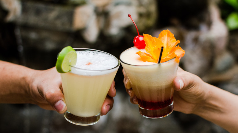 cheers with pisco drinks