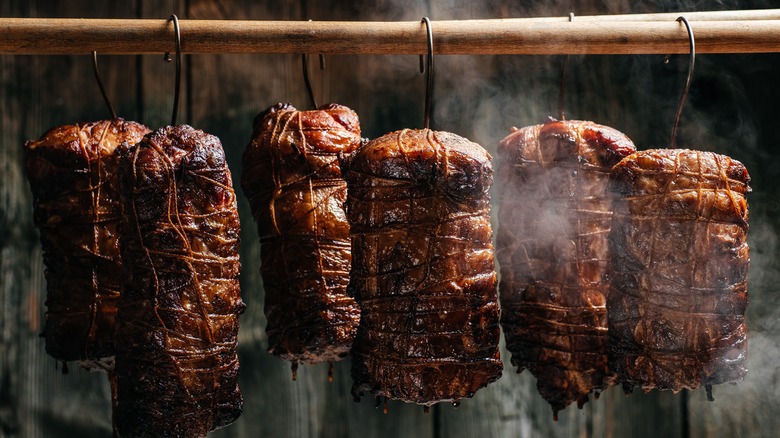 Hams being smoked