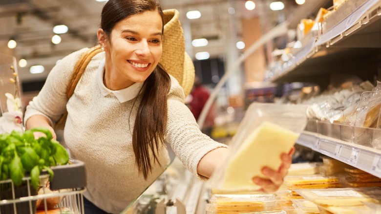 woman shopping for cheese