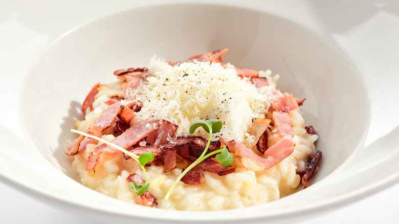 risotto with cured meat, grated parmesan and pepper