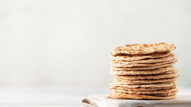 Flatbreads stacked on a plate