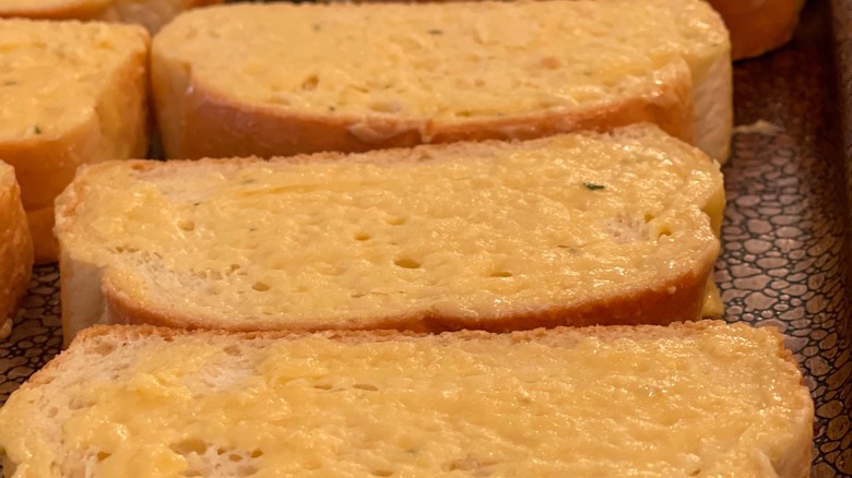 buttered Texas toast on pan