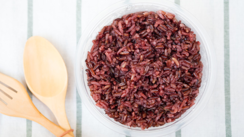 red rice with utensils