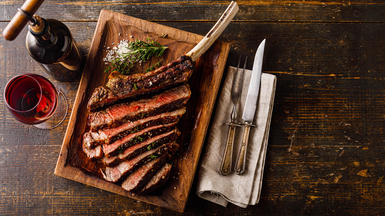 Tomahawk steak with wine