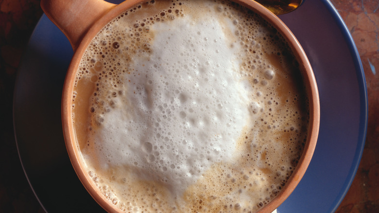 coffee in mug with foamed milk