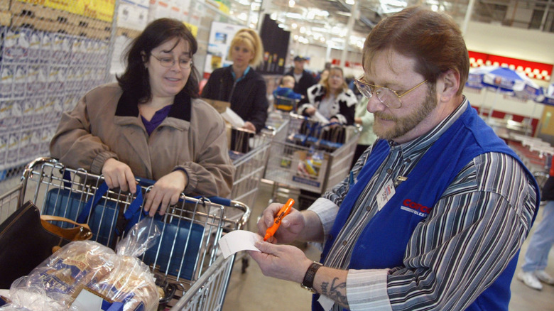 Costco employee and customer