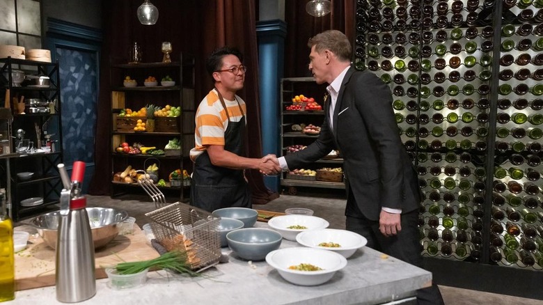 Viet Pham and Bobby Flay shaking hands