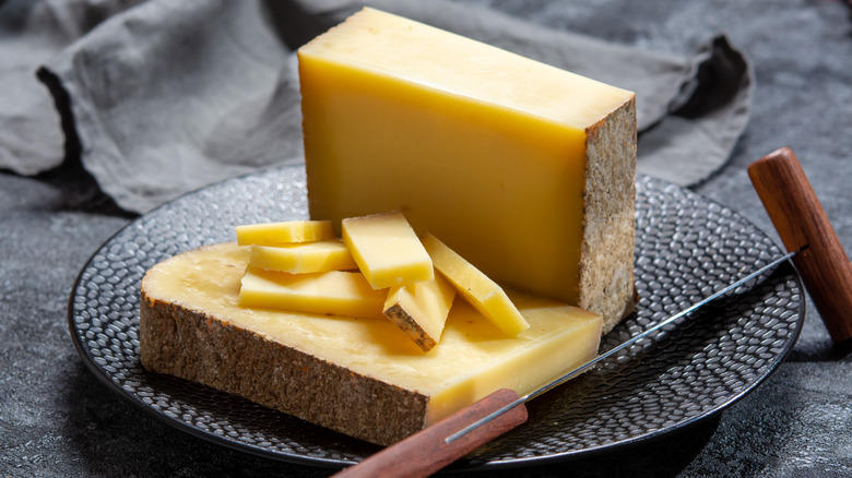 Comté cheese sliced on plate