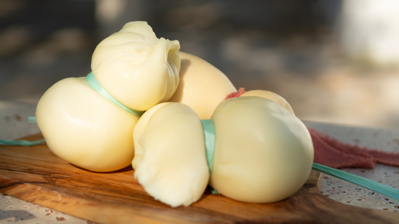 Scamorza cheese on board
