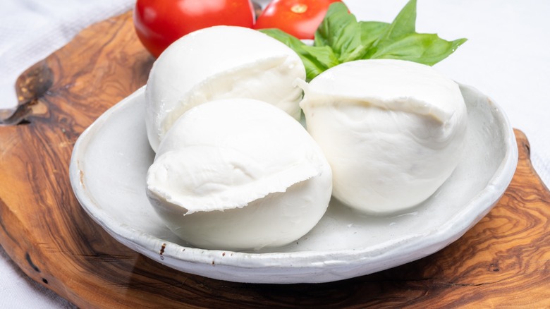 Fresh mozzarella on cutting board