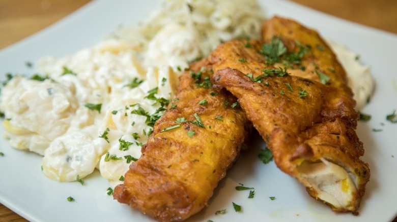 Fried fish with northern potato salad