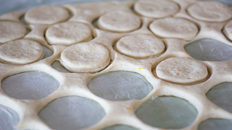 Donut dough cut into rounds